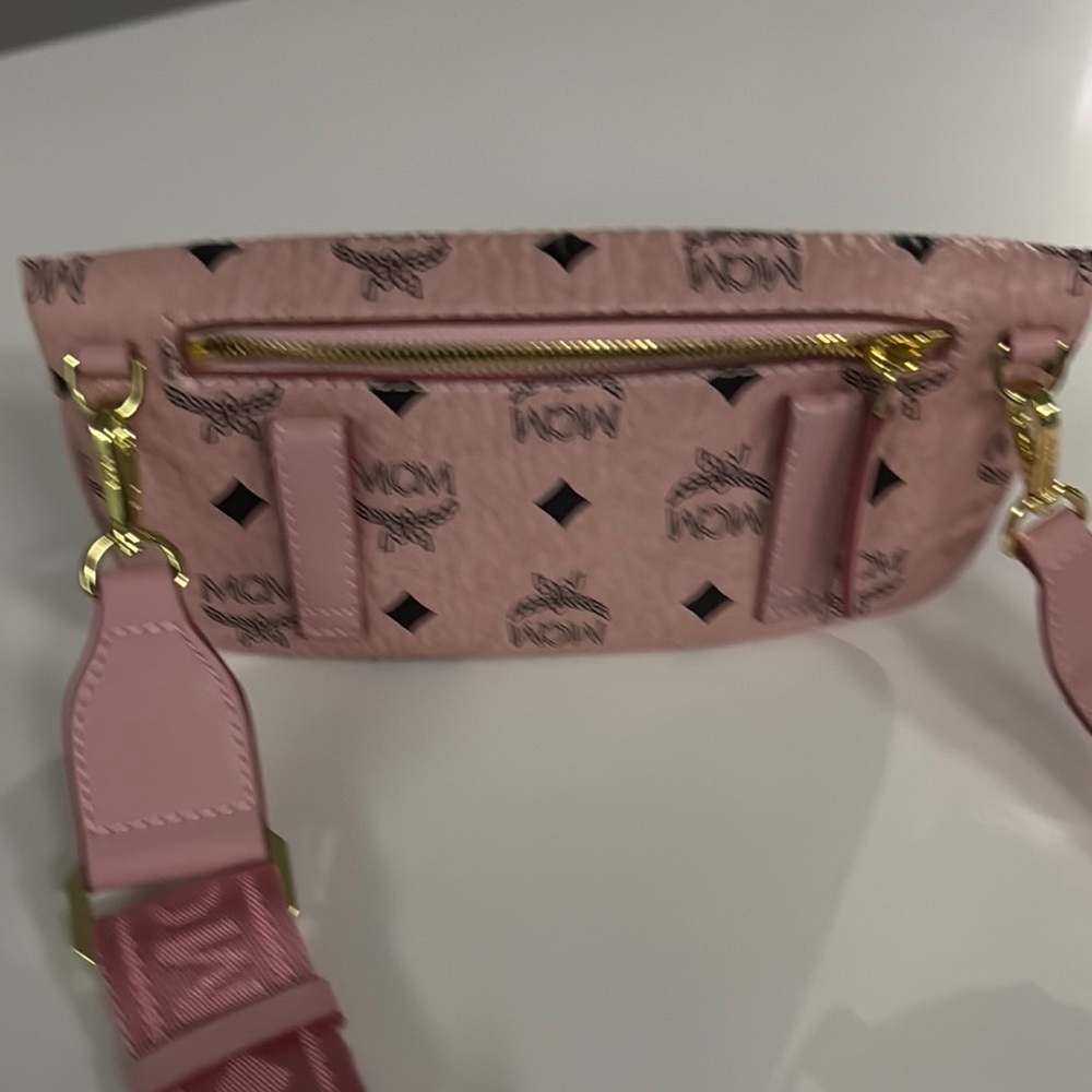 MCM Pink Crossbody Bag with Adjustable Strap and Luxurious Texture